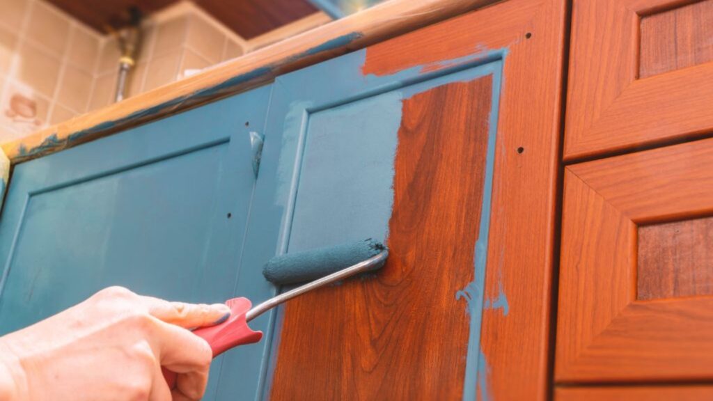 close-up of cabinet being refinished in kitchen